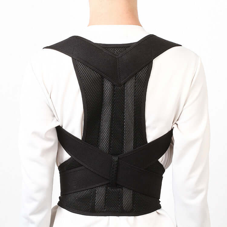 Person wearing an adjustable posture corrector for back support