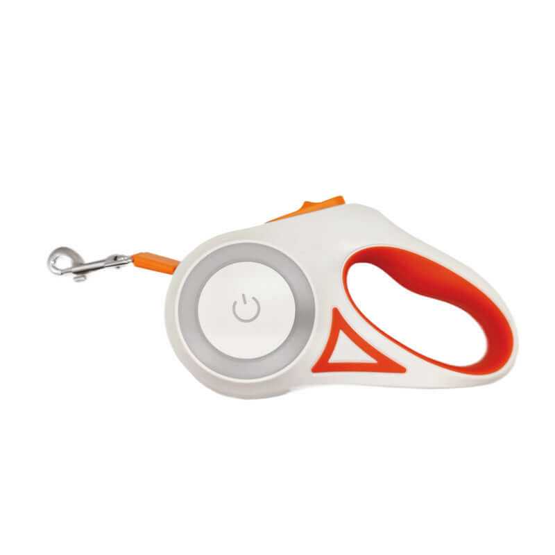 Dog walking at night with LED retractable dog leash glowing in the dark