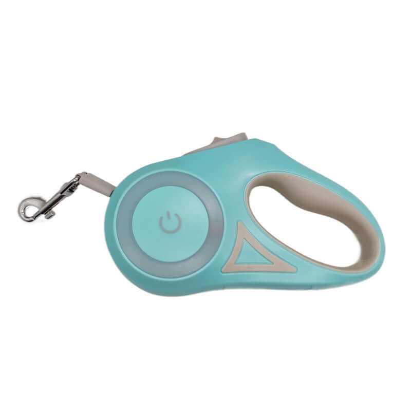 Dog walking at night with LED retractable dog leash glowing in the dark