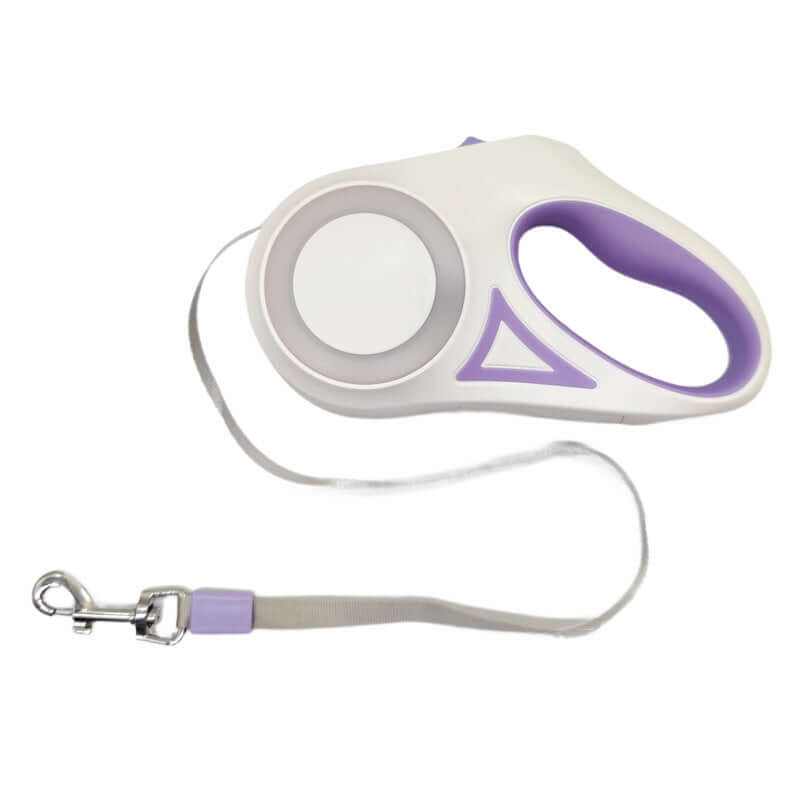 Dog walking at night with LED retractable dog leash glowing in the dark